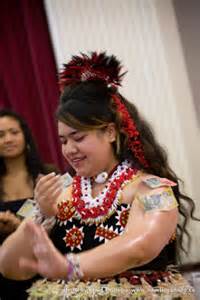 Tongan lady dressed in cultural attire dancing